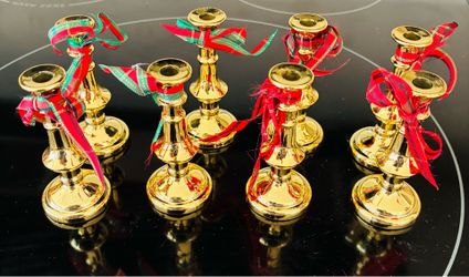 Brass miniature candle holders with ribbon bows, 8 total.