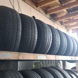 265 70 17 (4) high tread used tires FREE installation and balance