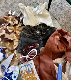Large Build-A-Bear clothing and accessory lot. Includes multiple outfits, shoes, accessories, hangers, and themed pieces.