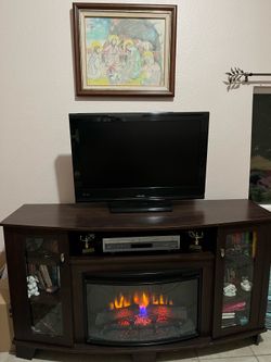 Tv stand heater with tv