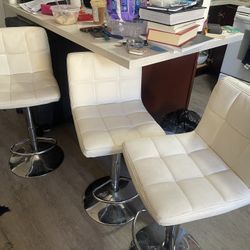 white leather bar stools x4
