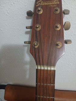 Guitarra y  chamarra  xl
