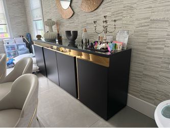 Black and gold credenza