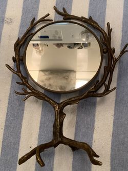 Beautiful brass style mirror magnifiers on one side