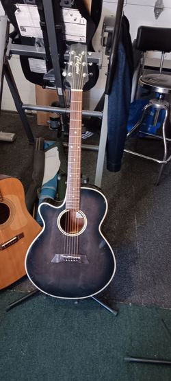 Left handed Takamine acoustic guitar
