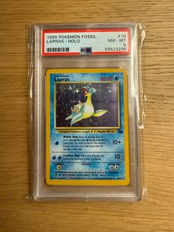 1999 Pokemon Fossil Lapras Holo PSA 8