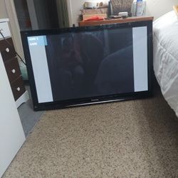 Old school fifty inch t v flat screen