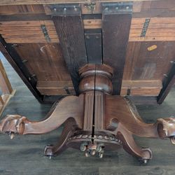 Round bottom claw foot table .