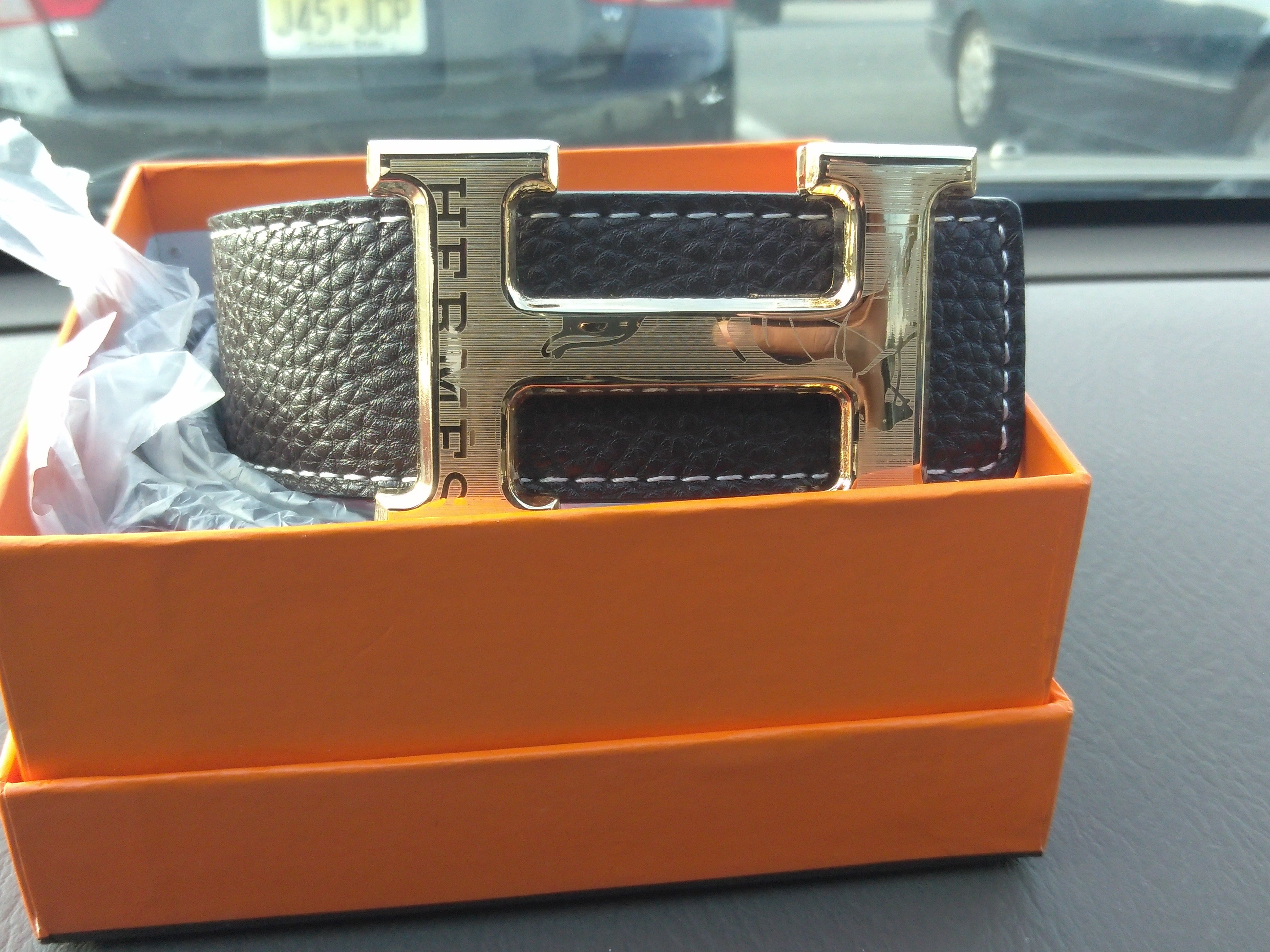 Hermes black and gold buckle