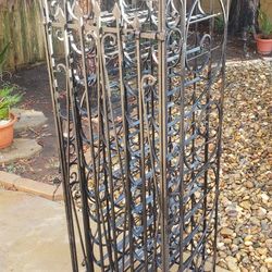 It's awesome handmaid rod iron wine Rack custom made cost me $800 shelling For $400