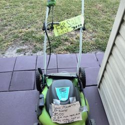 ELECTRIC PLUG IN LAWN MOWER/  IT STILL WORKS FINE 