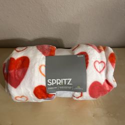 Soft Blanket (hearts) Retails $10.           50x60