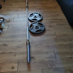 Barbell And 2-45 Pound Plates