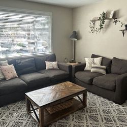 2 couches and corner table