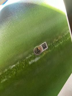 Three autographed items