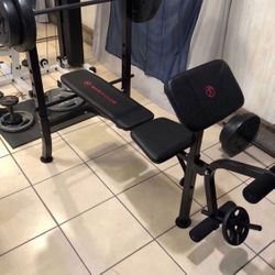 Gym Equipment Adjustable Bench press, barbell, leg developer and 100lbs of weight