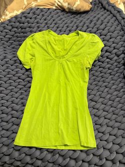 Soft short-sleeve tee with a wide scoop neckline.