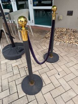 6 sets of (2) Black/Gold Crowd Control Stancions w/Purple Velvet Ropes