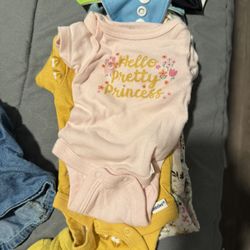 BRAND NEW and used LOT of baby clothing.