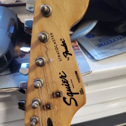 Squier Stratocaster by Fender – Used – Cream/White – $70