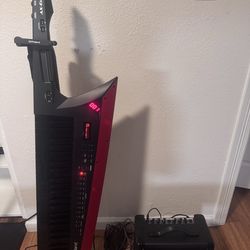 Roland AX Keyboard Guitar with Roland stand/Amp. 3 months old!! Mint