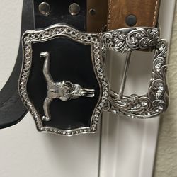 Two Western Belts Black with Bulls  40”   Brand  NaCona  Brown & Rust Silver & Rhinestones Brand  Tony Lama 39” excellent Cond   Both for 75& pk up Ev
