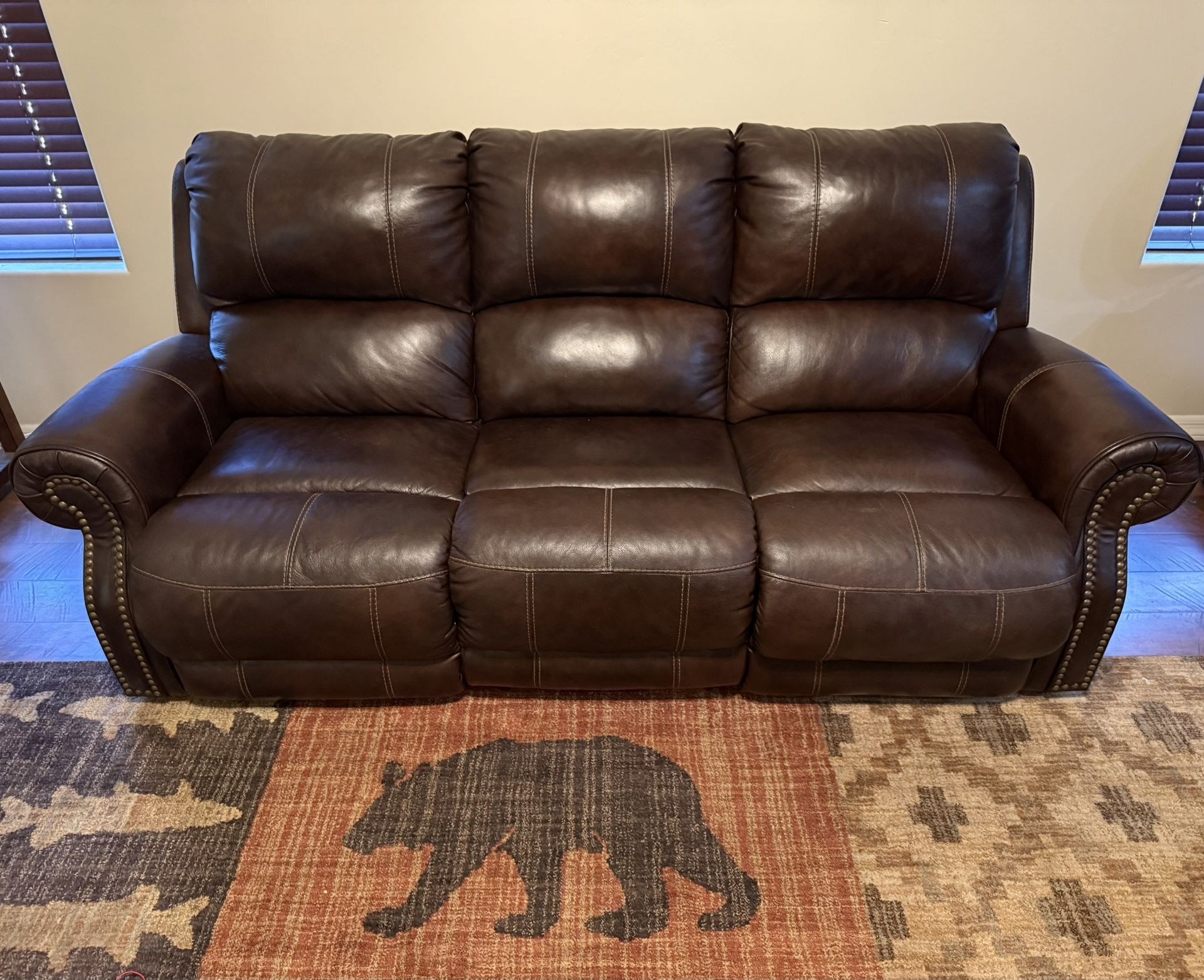 Leather Reclining Sofa By Ashley Furniture