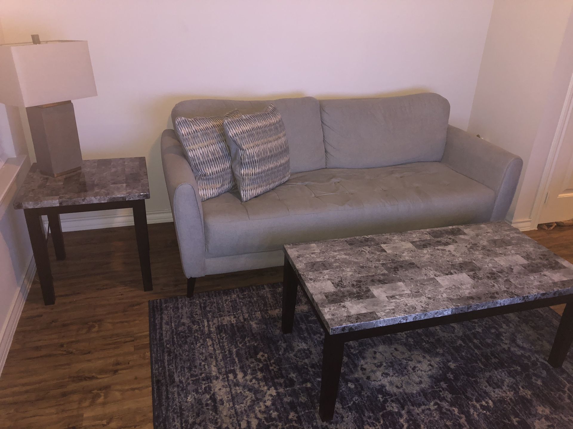 Living room set: couch, lounge chair, coffee table, 2 end tables and 2 lamps