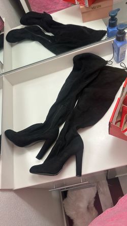 Over the knee high heel boots