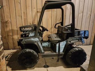 Big power wheels. Needs battery. Long 58". Wide 38". High 48"