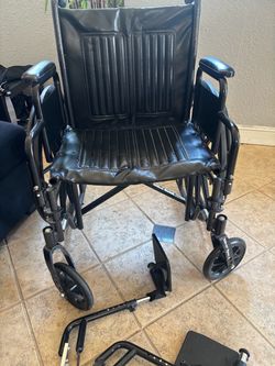 Black Folding Wheelchair with Removable Footrests