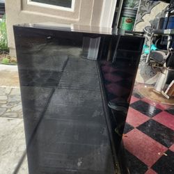 Freestanding Frigidaire wine or beverage fridge with light. 33” high x 17.5 deep x 19 wide. 
