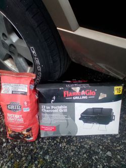 A 17" portable charcoal grill & bag charcoal