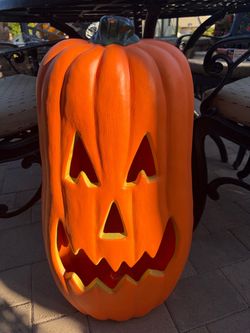 Tall lighted pumpkin