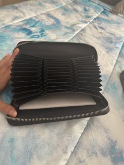 black clutch/wallet w/ many card slots