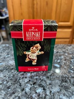 Hallmark Keepsake “1992 Love to Skate” ornament. The ornament has the year 1992 on it. Size approximately 2 3/4 inches long . Has been stored in a