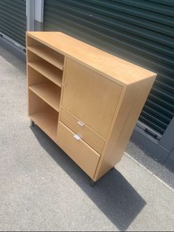 Light Wood Cabinet with Shelves and Drawers