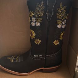 Botas  Número 8    En 120. 