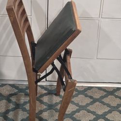 Vintage folding wooden slatted back chair.