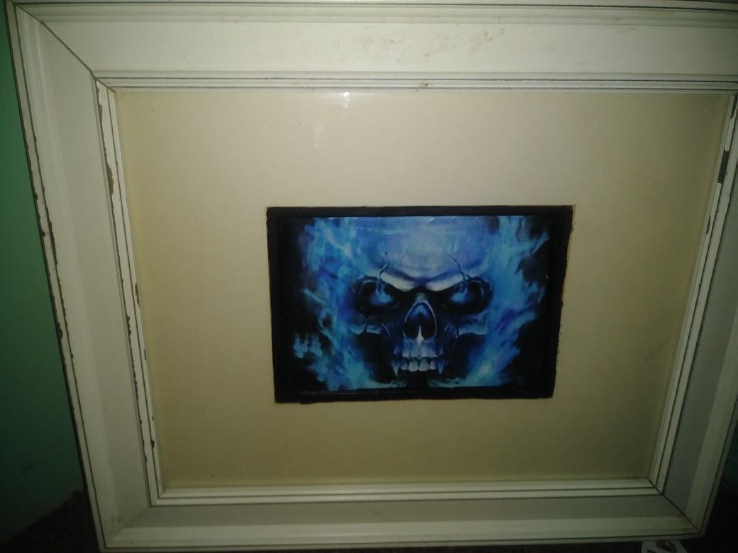 Flaming blue skull