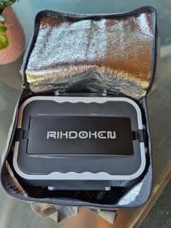 Travel heated lunch box. NEW