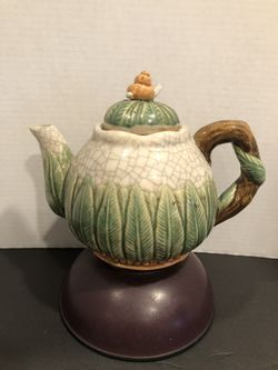 Majolica teapot crackle , leaf , snail design