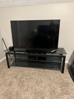 Large TV and TV stand