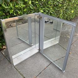 New Medicine Cabinet  w /mirror. firm on Price.