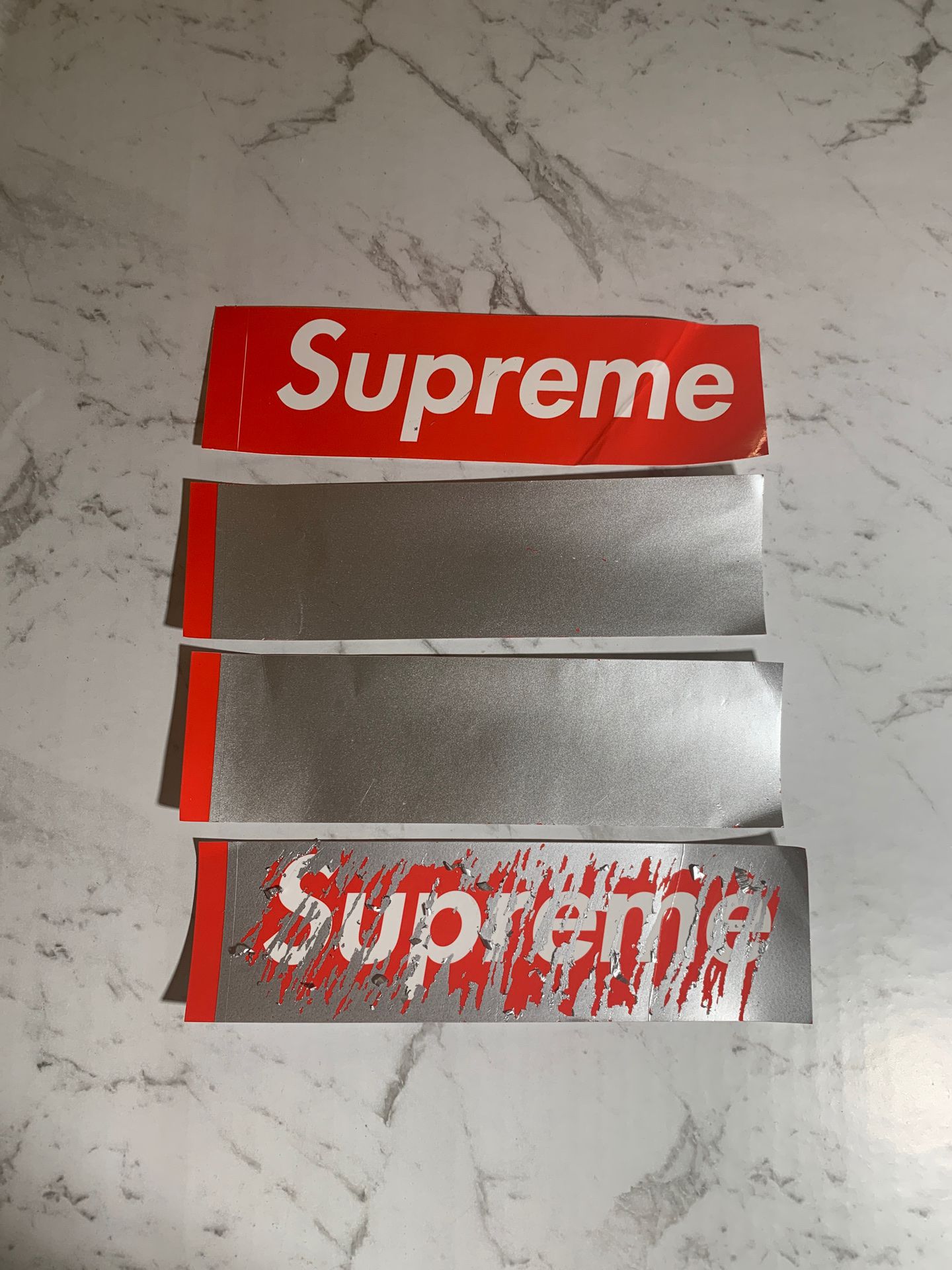 3 scratch off supreme stickers plus one free supreme sticker