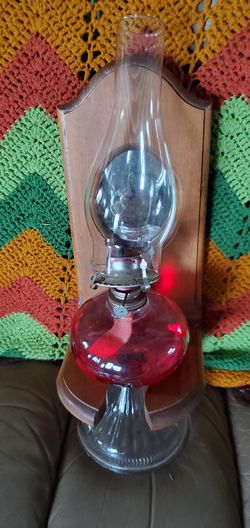 Oil lamp with wall hanger holder