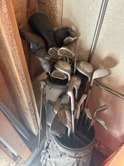 2sets of golf clubs