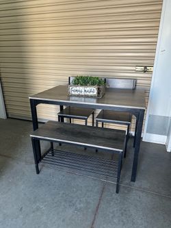 Table with 2 chairs and a bench