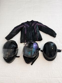 Motorcycle helmets and woman’s leather coat
