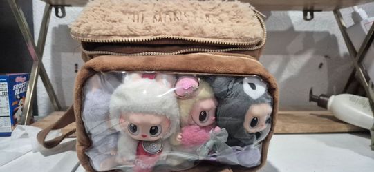 Monsters Labubu backback & 4 labubus used